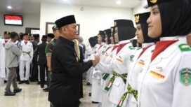 Bupati Luwu Timur, Irwan Bachri Syam, mengukuhkan 70 Pasukan Pengibar Bendera Pusaka (Paskibraka) Merah Putih Kabupaten Lutim Tahun 2025, di Aula Awana Wisma Trans, Kamis 14 Agustus 2025.