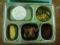 Ilustrasi penyaluran makanan bergizi gratis di sekolah